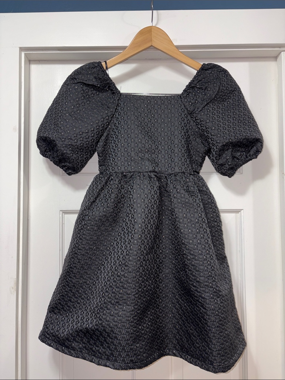 Black and gold daisy print dress